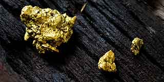 Goldpreis fällt vom Neunmonatshoch zurück